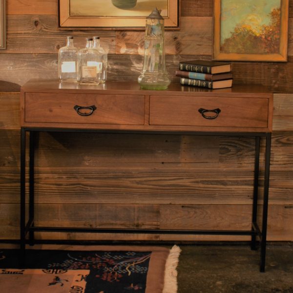 wood console table with metal base and accents