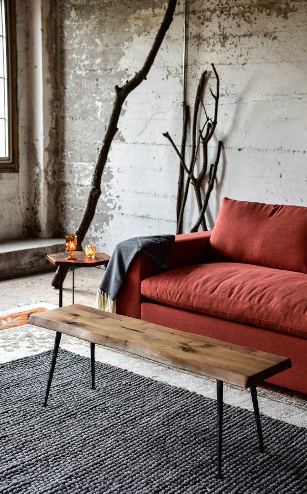 Red sofa in living room with decor