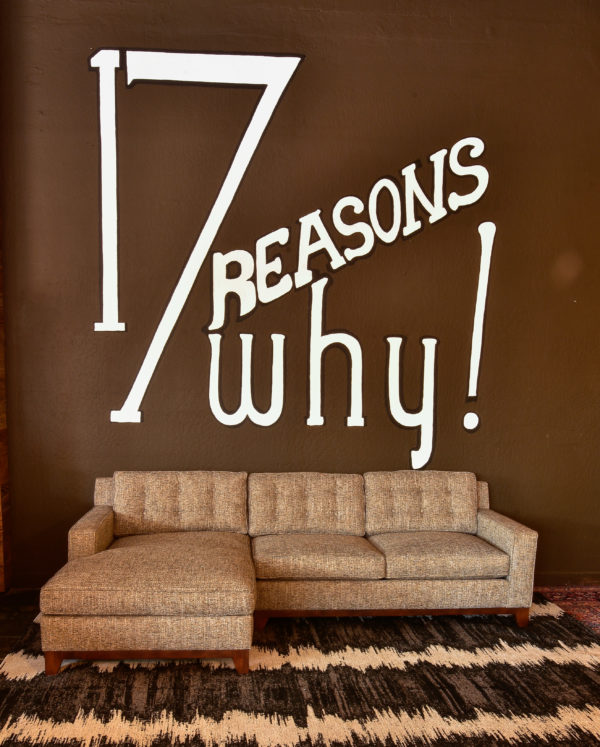 Grey sofa in living room with decor