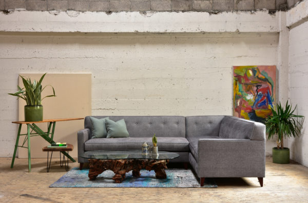 Grey sofa in living room with decor