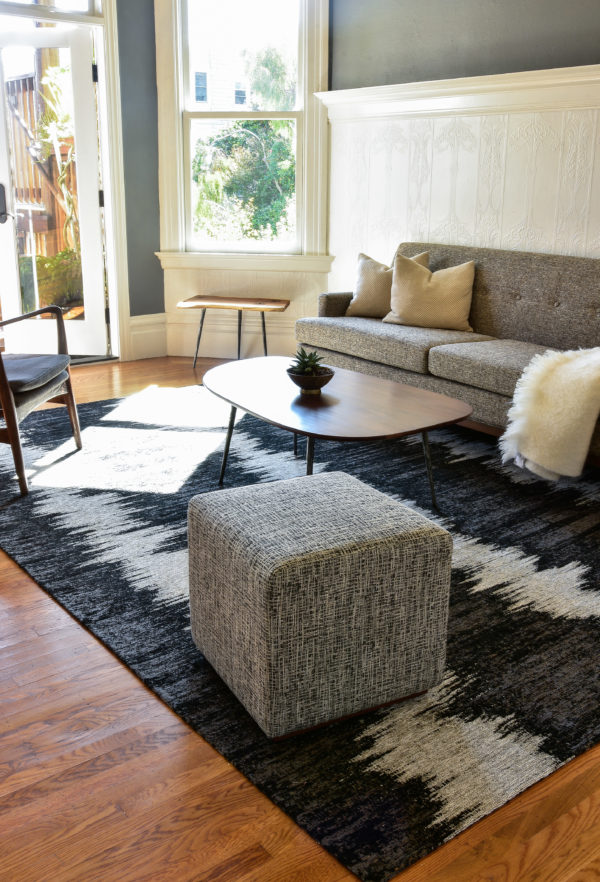 Grey sofa in living room with decor