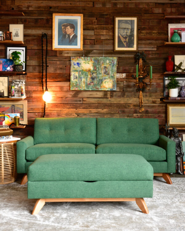 Green ottoman and sofa in living room