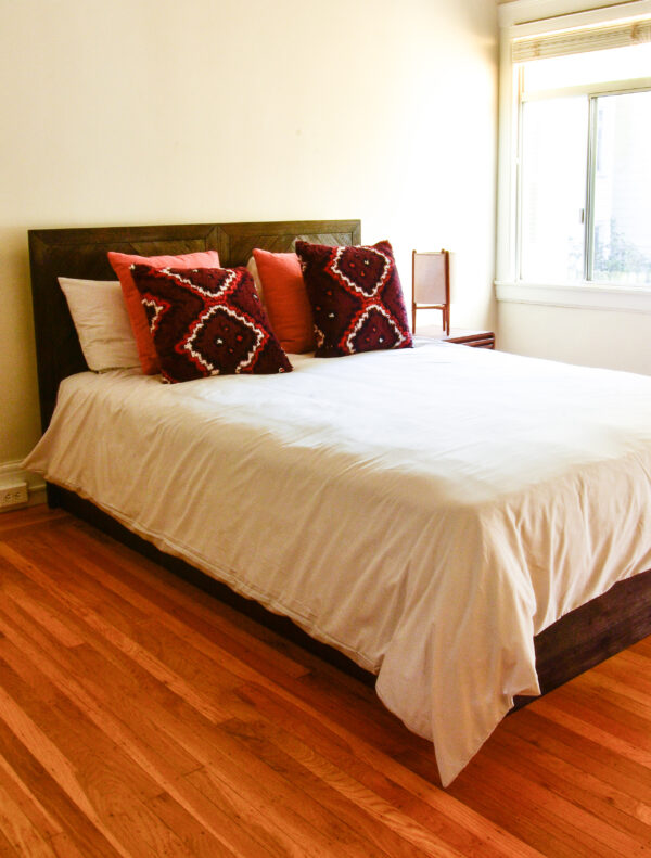 Bed with decorative pillows