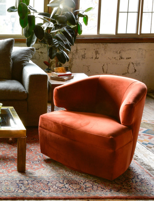 Mid century modern swivel chair in living room