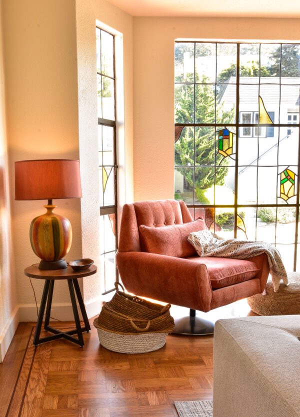 Rust colored accent chair in living room