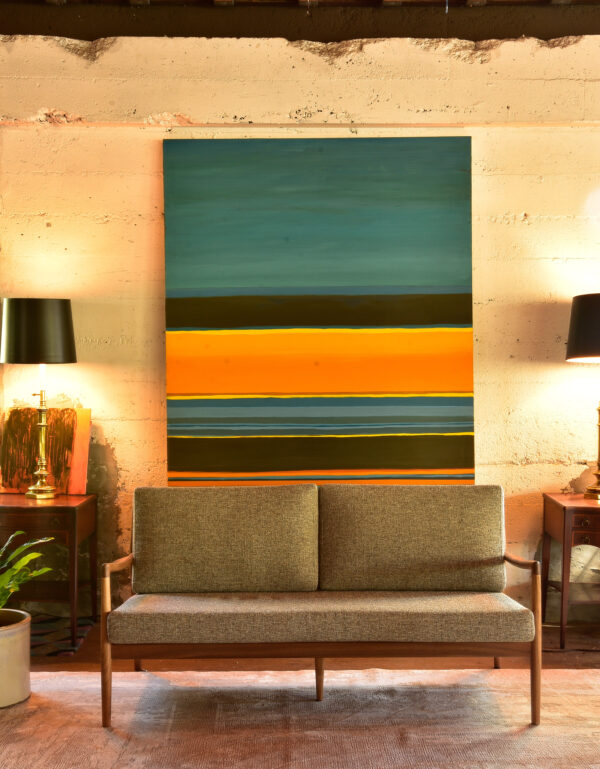 large colorful painting in a living room