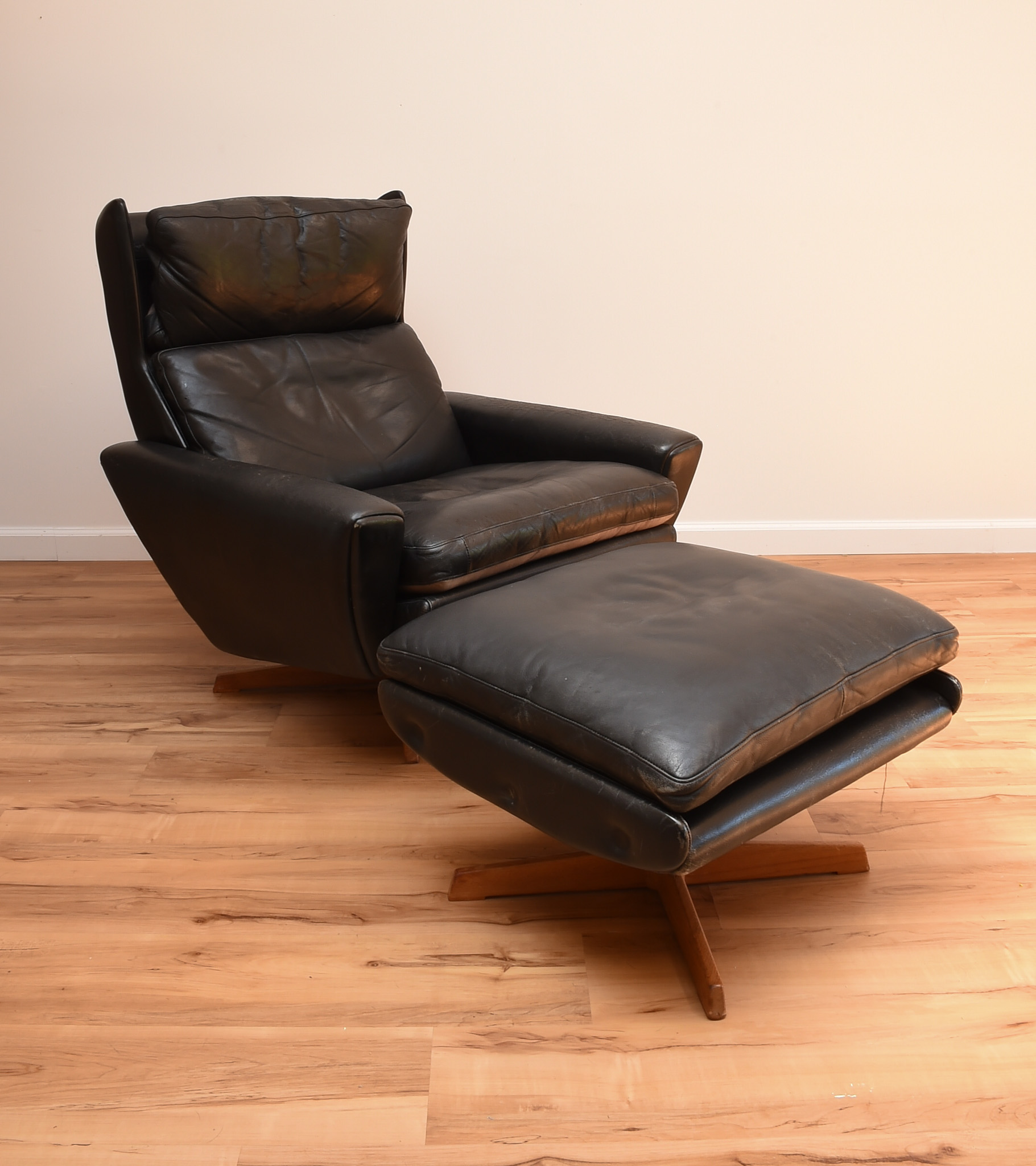 Black Leather Chair and Ottoman